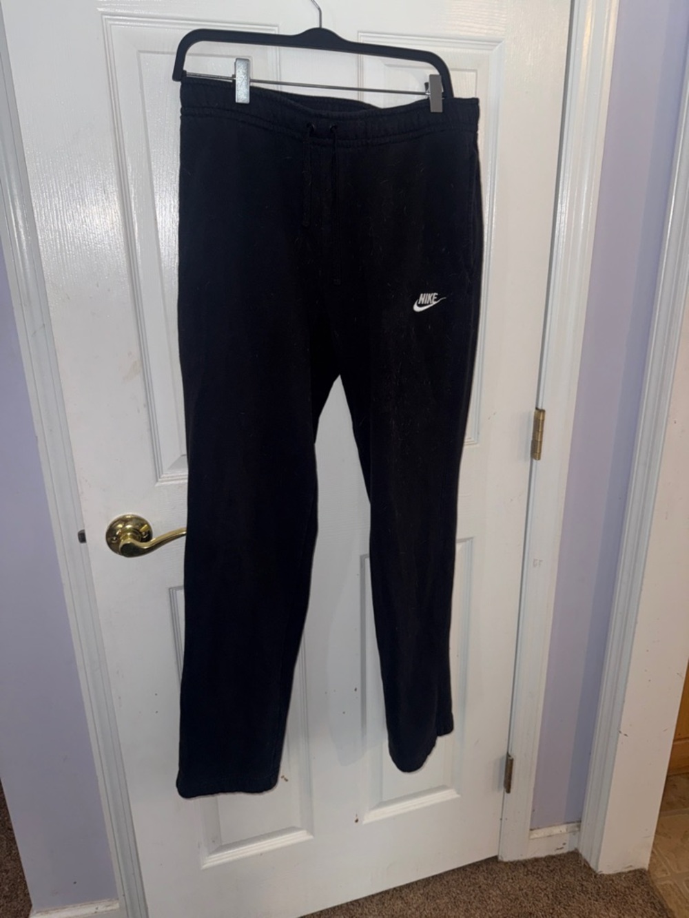 Nike Black Joggers with White Swoosh Logo